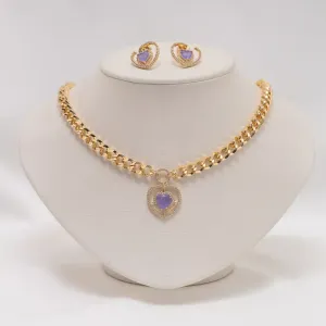 CONJUNTO CORAÇÃO ZIRCÔNIA ROXA BANHO OURO 18K