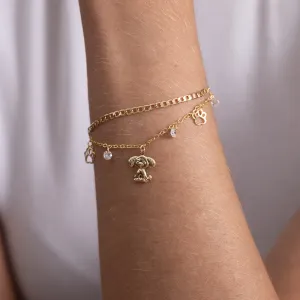 PULSEIRA CORRENTE DUPLA COM CACHORRINHO BANHO OURO 18K