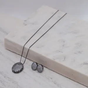 CONJUNTO OVAL COM ZIRCÔNIAS CRISTAIS BANHO RÓDIO NEGRO