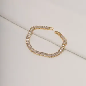 PULSEIRA RIVIERA COM ZIRCÔNIAS NAVETE CRISTAIS BANHO OURO 18K