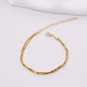 PULSEIRA TRANÇADA FINA BANHO OURO 18K