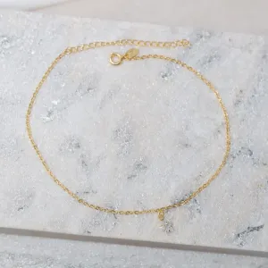 TORNOZELEIRA COM PINGENTE ESTRELA CRISTAL BANHO OURO 18K