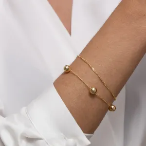 PULSEIRA TORCIDA FINA BANHO OURO 18K