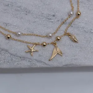 TORNOZELEIRA CORRENTE DUPLA MAR BANHO OURO 18K