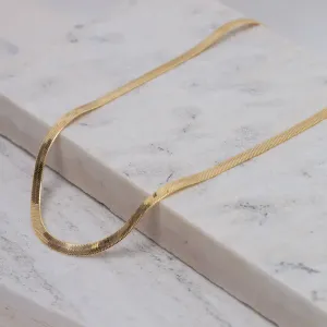 CHOKER FITA GROSSA LAMINADA BANHO OURO 18K