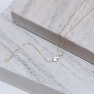 COLAR PÊNDULO COM PONTO DE LUZ CRISTAL BANHO OURO 18K