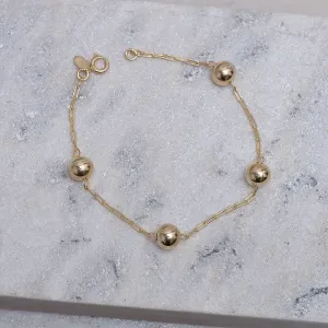 PULSEIRA BOLINHAS M LISAS BANHO OURO 18K