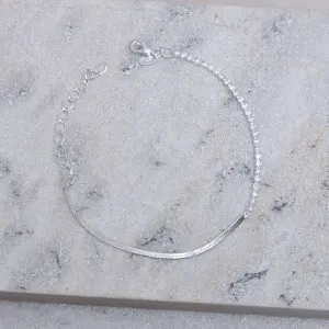 PULSEIRA FITA ESPELHADA E COM ZIRCÔNIAS BANHO PRATA