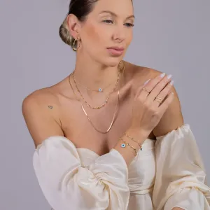 PULSEIRA VENEZIANA FINA COM OLHO GREGO BANHO OURO 18K