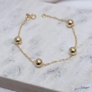 PULSEIRA BOLINHAS M LISAS BANHO OURO 18K