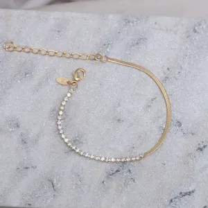 PULSEIRA FITA ESPELHADA E COM ZIRCÔNIAS BANHO OURO 18K