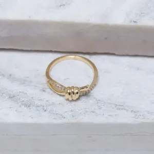 ANEL NÓ COM ZIRCÔNIAS CRISTAIS BANHO OURO 18K