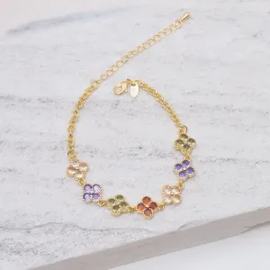 PULSEIRA FLOR CRAVEJADA COM ZIRCÔNIAS COLORIDAS BANHO OURO 18K