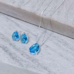 CONJUNTO GOTA COM PEDRA AZUL CLARO BANHO PRATA