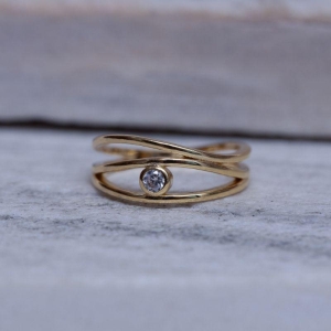 ANEL OLHO GREGO COM PEDRA CRISTAL BANHO OURO 18K