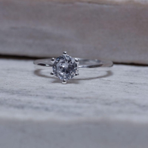 ANEL SOLITÁRIO 6 GARRAS BANHO PRATA