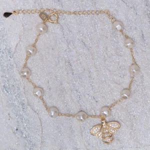 PULSEIRA PÉROLA COM LIBÉLULA CRAVEJADA BANHO OURO 18K