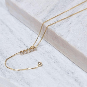 COLAR PÊNDULO COM ZIRCÔNIAS BANHO OURO 18K