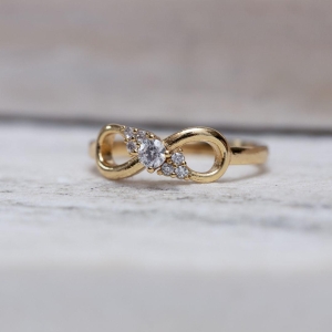 ANEL LAÇO COM ZIRCÔNIAS CT BANHO OURO 18K