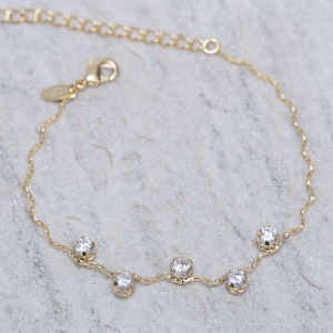 PULSEIRA ONDULADA COM PEDRAS CRISTAIS BANHO 18K