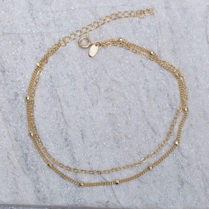 TORNOZELEIRA DUPLA COM BOLINHAS BANHO OURO 18K