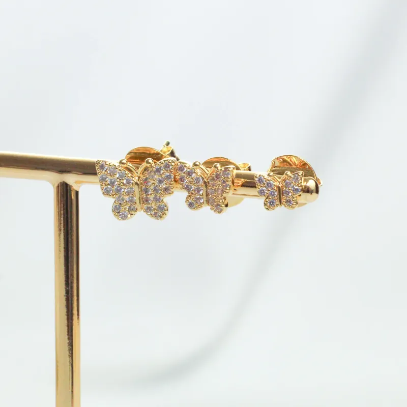 BINCO BORBOLETA EM ZIRCÔNIA M BANHO OURO 18K