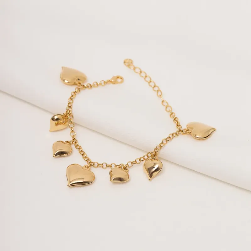 PULSEIRAS COM PINGENTE CORAÇÕES BANHO OURO 18K
