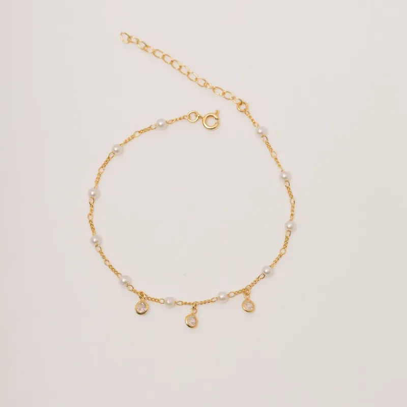 TORNOZELEIRA PERÓLA COM ZIRCÔNIAS PENDURADAS BANHO OURO 18K