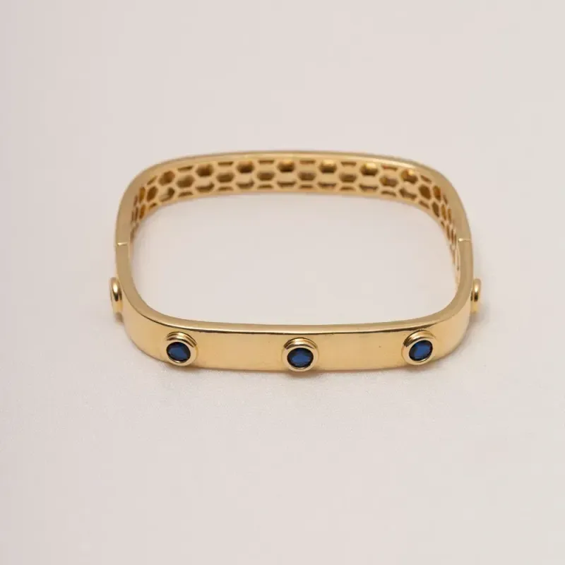 BRACELETE COM 5 ZIRCÔNIAS COR AZUL ESCURO BANHO OURO 18K