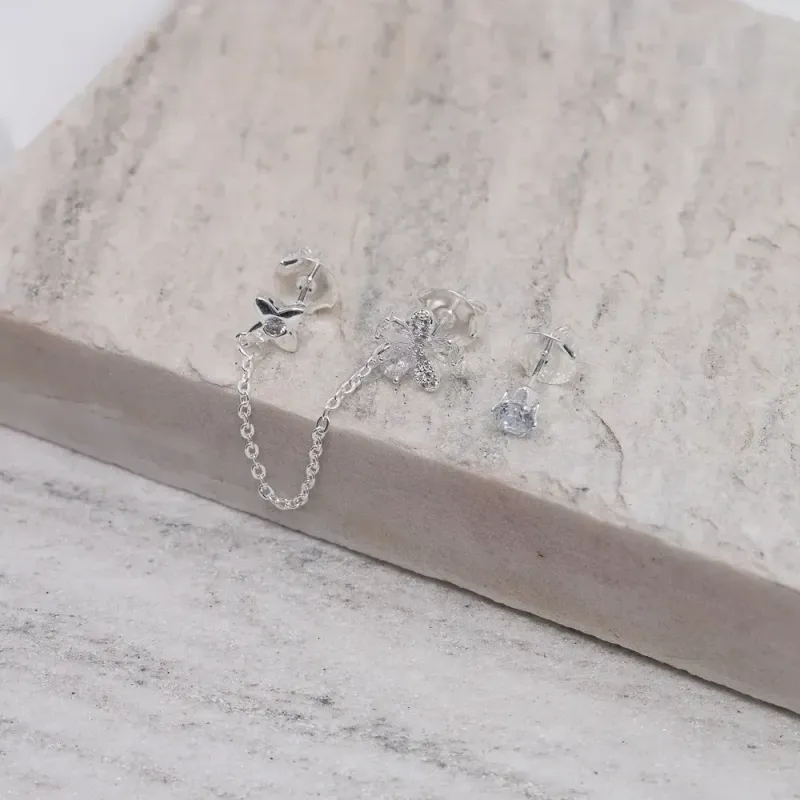 BRINCO EAR CUFF FLOR COM CORRENTE BANHO PRATA