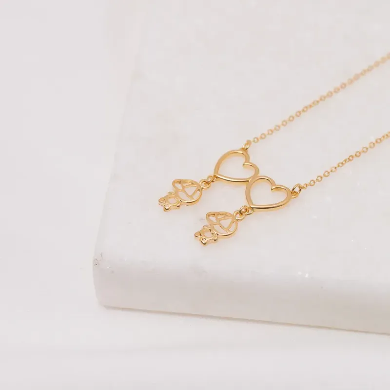 COLAR FILHOS CORAÇÃO DOIS MENINOS BANHO OURO 18K