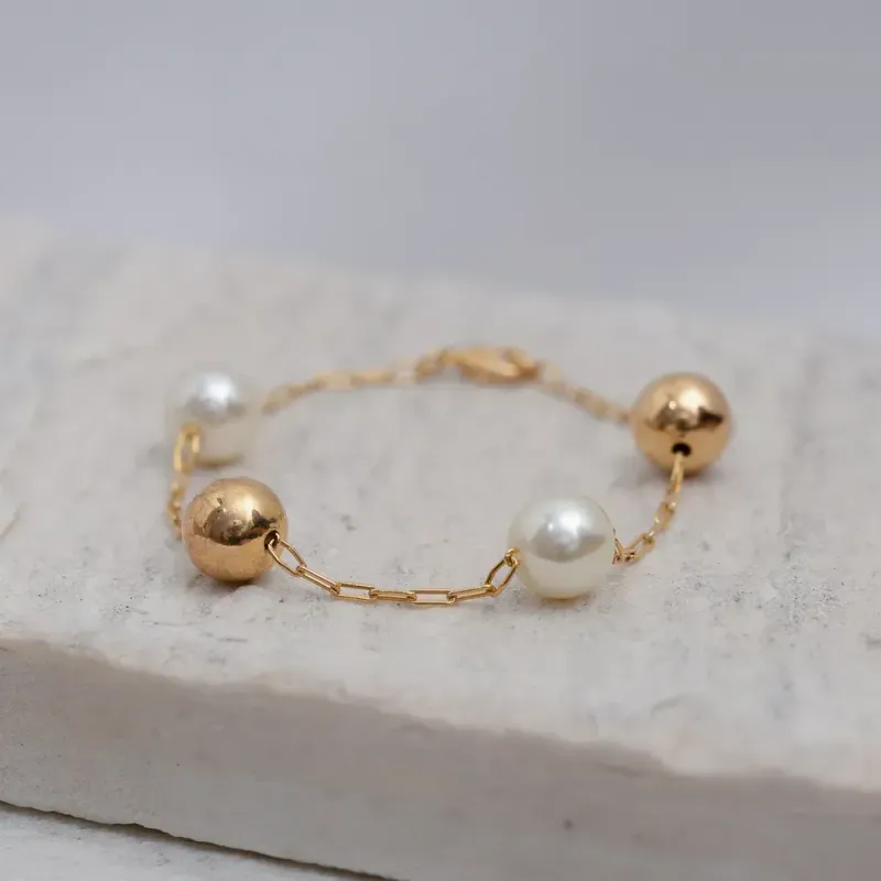 PULSEIRA BOLINHA M LISA E PÉROLA BANHO OURO 18K