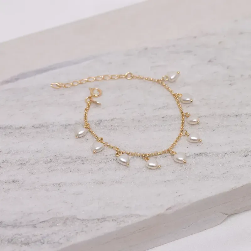 PULSEIRA CORAÇÃO EM PÉROLA BANHO OURO 18K