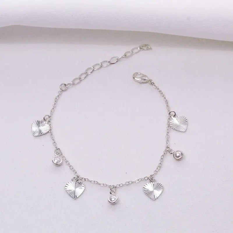 PULSEIRA CORAÇÃO DIAMANTADO E PÉROLAS BANHO RÓDIO BRANCO