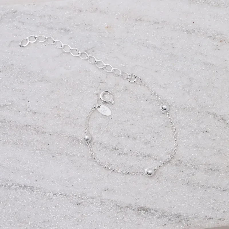 PULSEIRA INFANTIL ELO PORTUGUÊS COM BOLINHAS BANHO PRATA