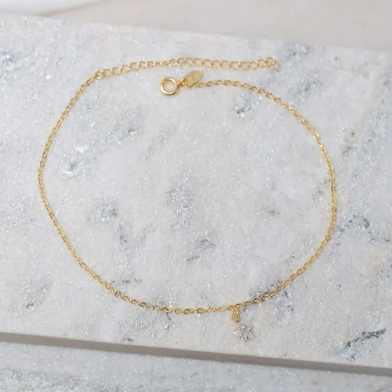 TORNOZELEIRA COM PINGENTE ESTRELA CRISTAL BANHO OURO 18K