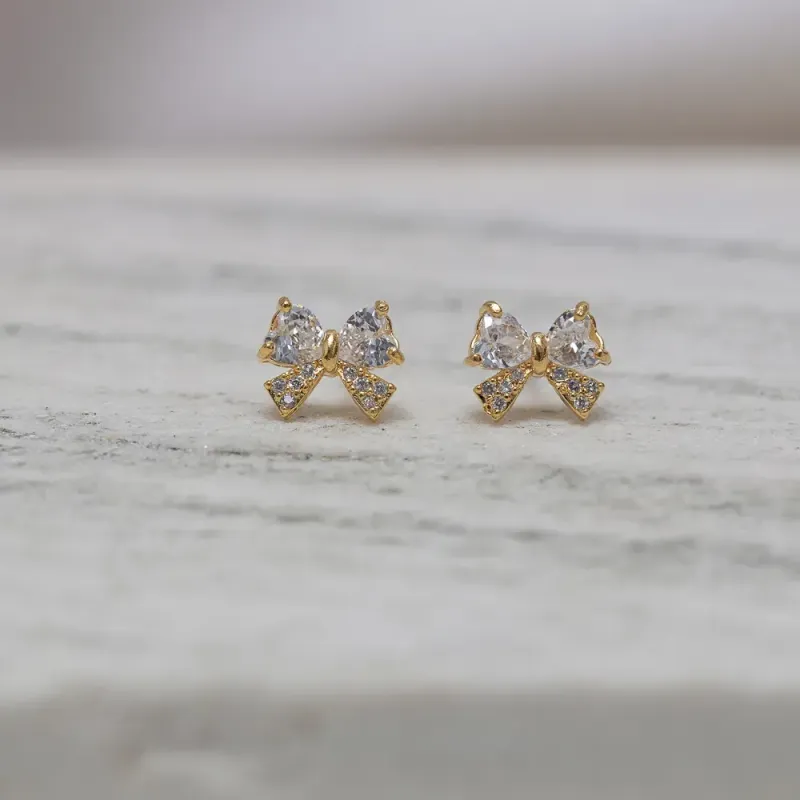 BRINCO LAÇO COM ZIRCÔNIA M BANHO OURO 18K
