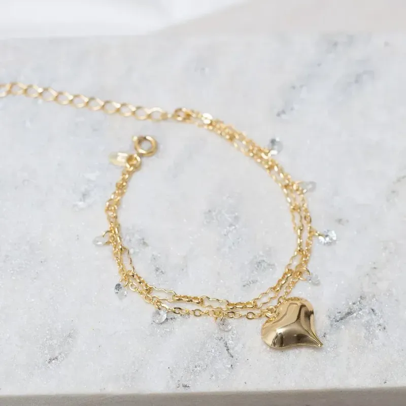 PULSEIRA DUPLA CORAÇÃO E PEDRA CRISTAL BANHO OURO 18K