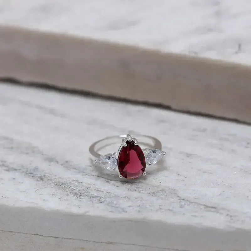 ANEL FORMATURA GOTA COM PEDRA MARSALA BANHO PRATA