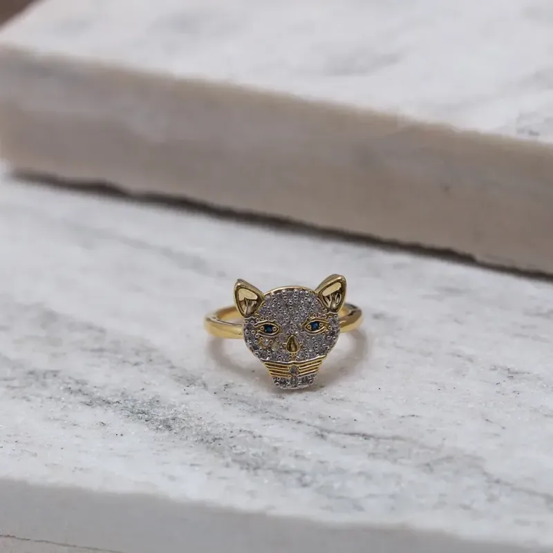 ANEL TIGRE CRAVEJADO COM OLHO VERDE BANHO OURO 18K