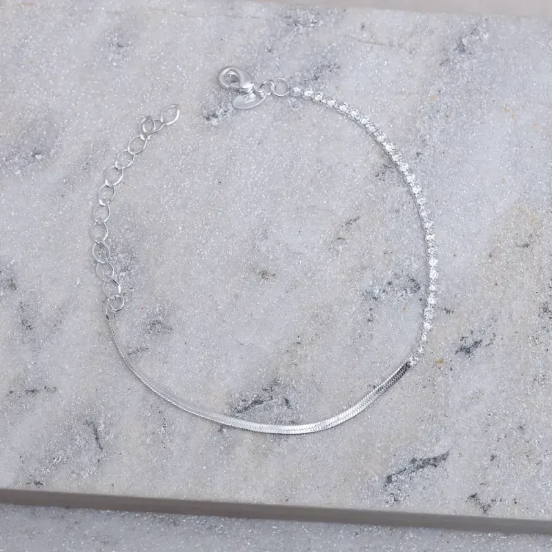 PULSEIRA FITA ESPELHADA E COM ZIRCÔNIAS BANHO PRATA