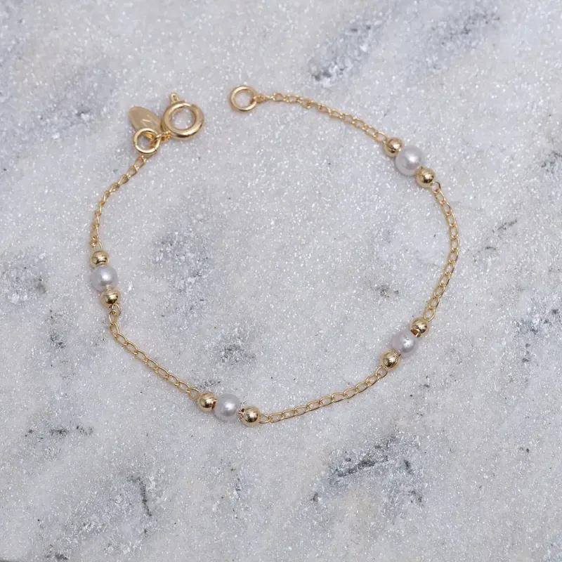 PULSEIRA INFANTIL PÉROLA E BOLINHAS LISAS BANHO OURO 18K