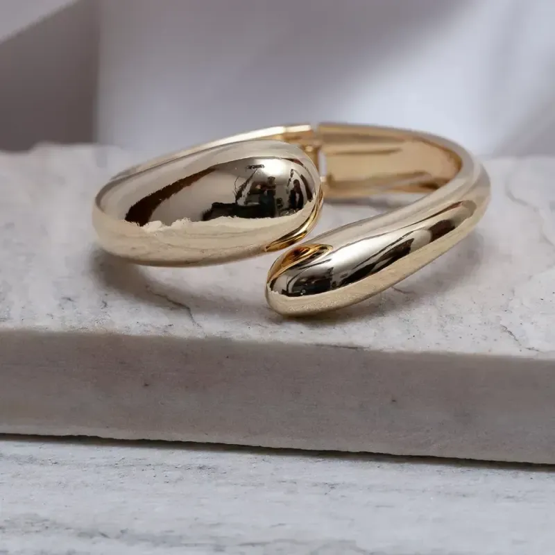 BRACELETE ABAULADO ABERTO BANHO OURO 18K