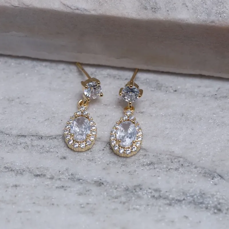 BRINCO GOTA COM PEDRA CRISTAL BANHO OURO 18K