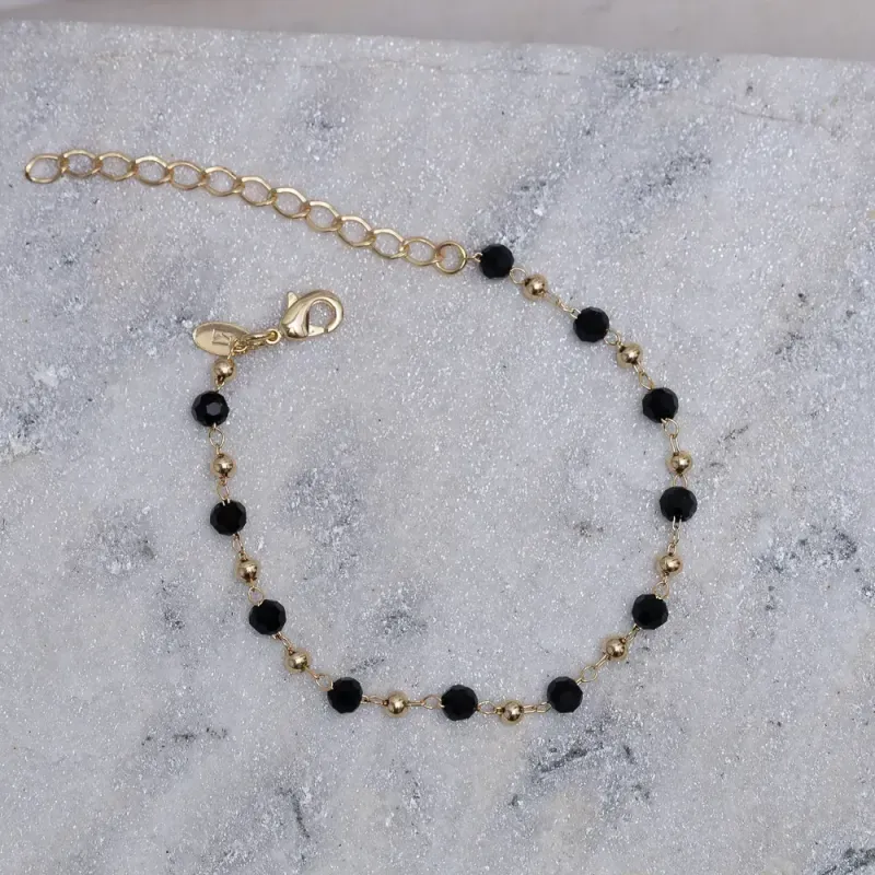 PULSEIRA BOLINHAS DOURADAS E NEGRAS BANHO OURO 18K