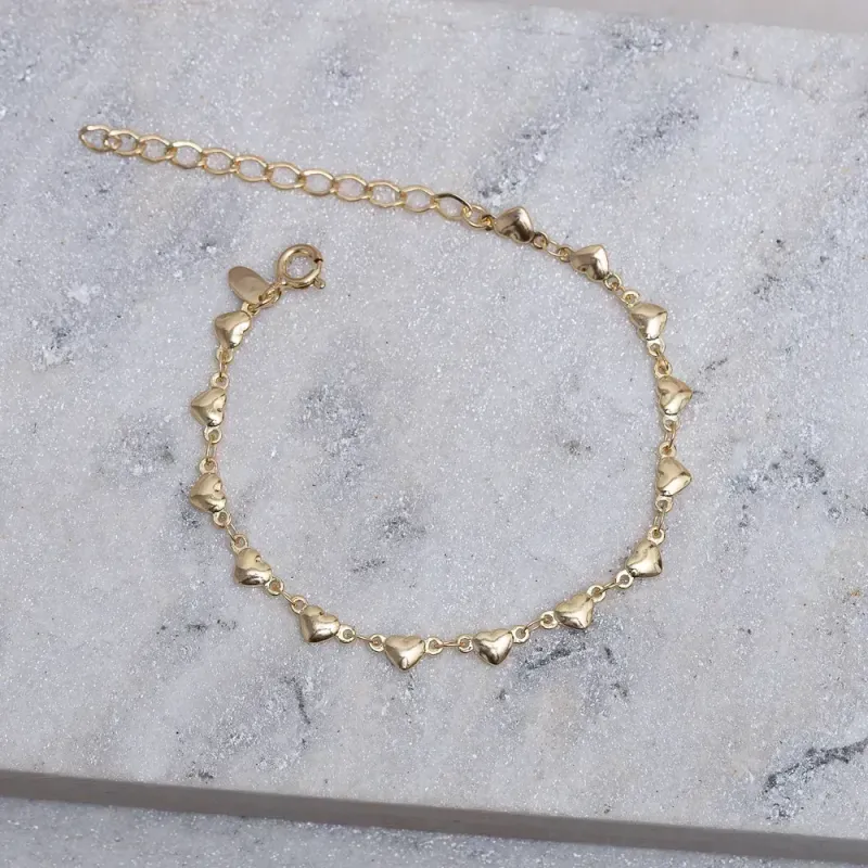 PULSEIRA CORAÇÃO PP ABAULADOS BANHO OURO 18K