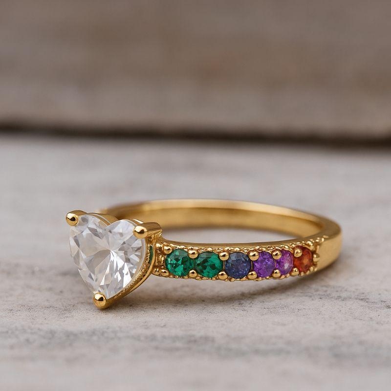 ANEL CORAÇÃO CRISTAL CRAVEJADO COM ZIRCÔNIAS COLORIDAS BANHO OURO 18K
