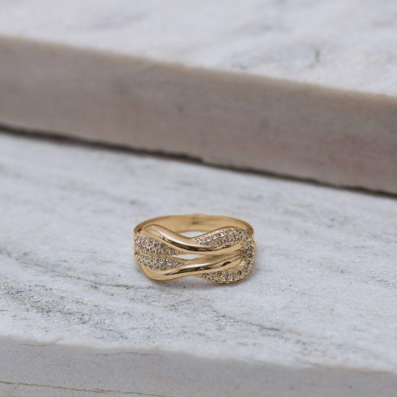 ANEL NÓ LUXO CRAVEJADO COM ZIRCÔNIAS BANHO OURO 18K