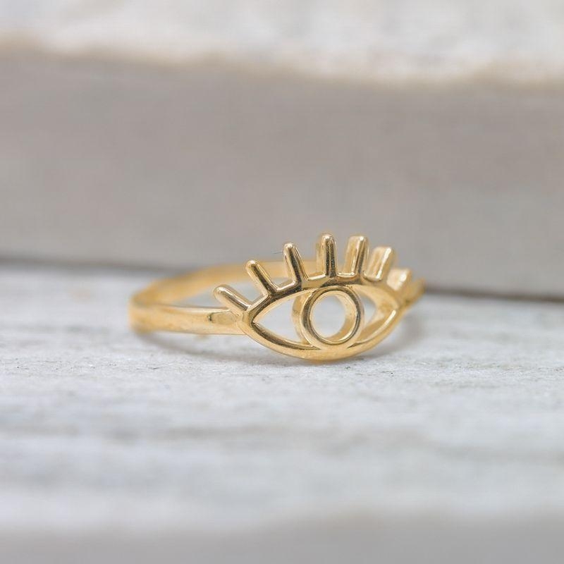 ANEL OLHO GREGO LISO BANHO OURO 18K
