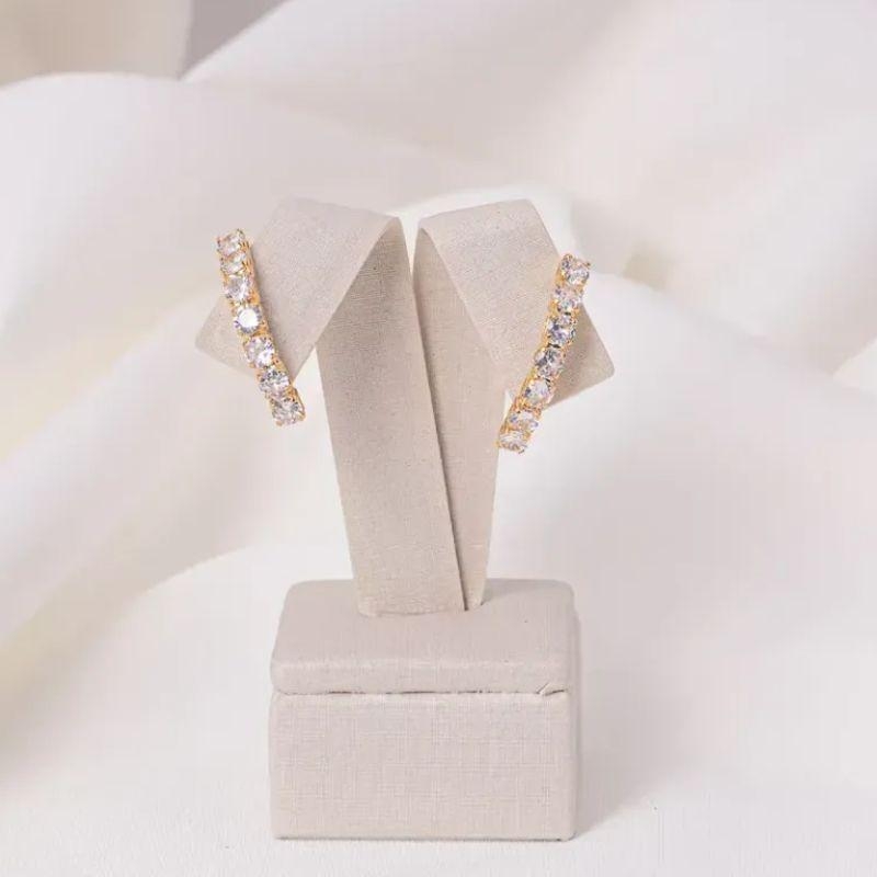 BRINCO EAR CUFF ZIRCÔNIAS BANHO OURO 18K